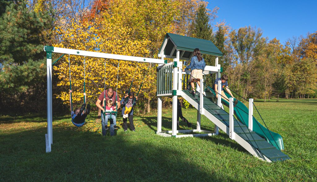 Vinyl swing set ramp with rope handrails"