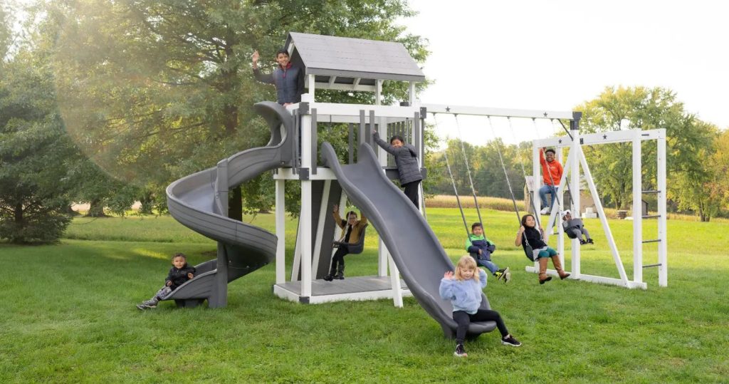 A vinyl swingset showcasing a 6 foot deck height