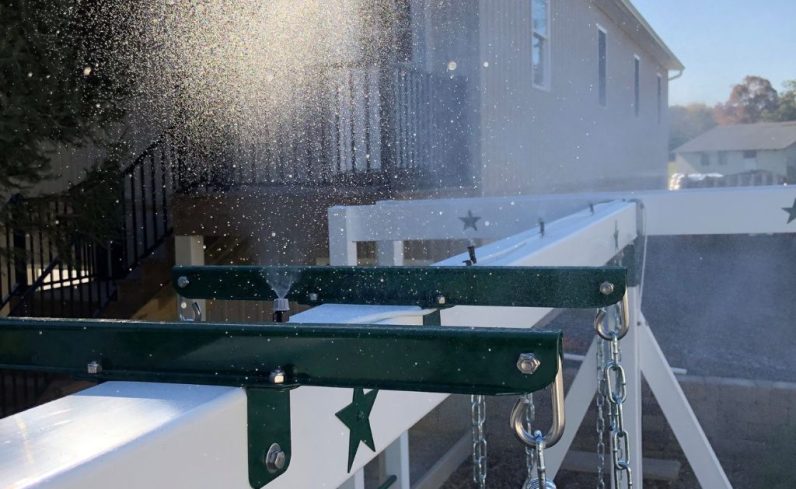 Mist system for a cooling swingset accessory