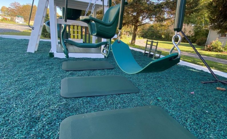 Unique swing set safety features for landing