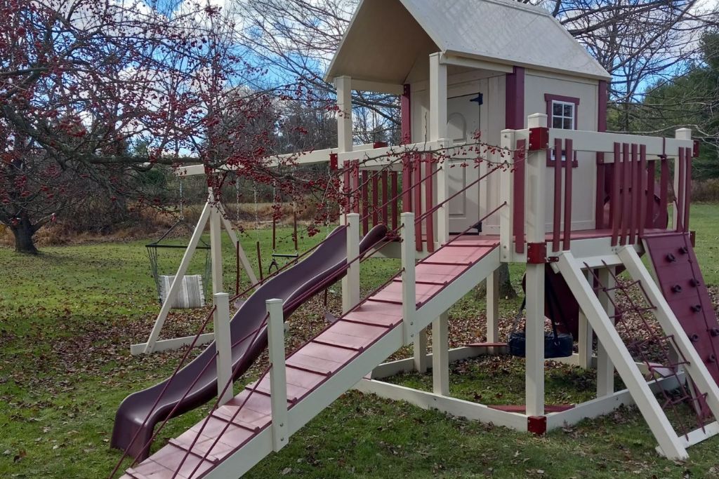 home playground equipment with playhouse and swingset